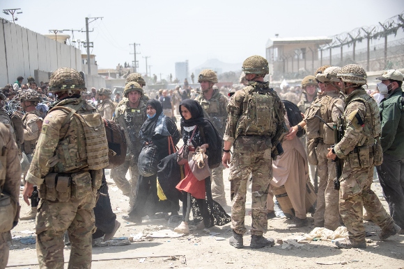 British armed forces work with the U.S. military to evacuate eligible civilians and their families out of Afghanistan