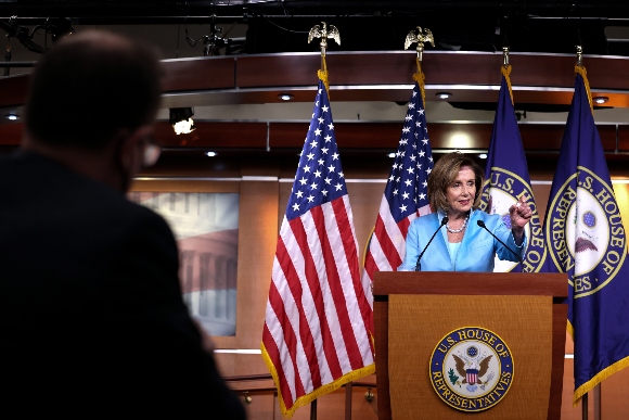 Speaker Nancy Pelosi (D-Calif.) answers reporters' questions