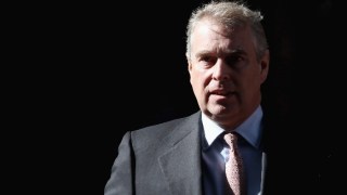 Prince Andrew, Duke of York, leaves the headquarters of Crossrail at Canary Wharf in London