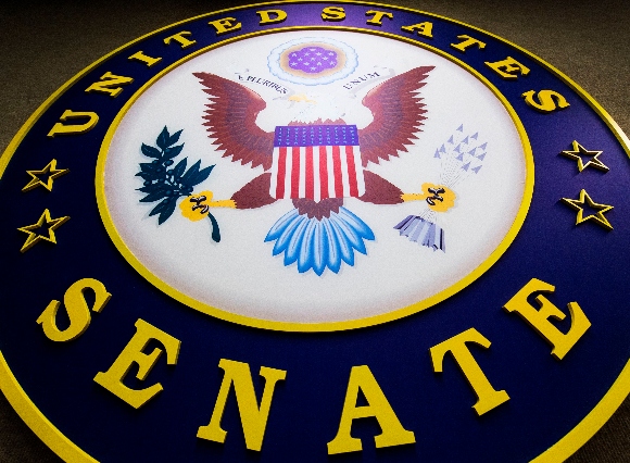 The seal for the US Senate is seen hanging on the wall inside the Senate Radio-TV gallery