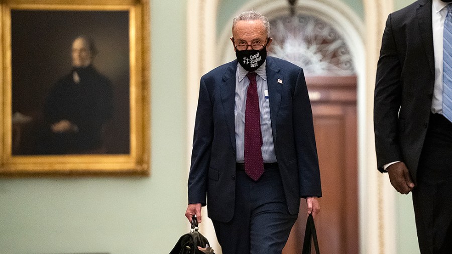 Majority Leader Charles Schumer (D-N.Y.) arrives to the Capitol on Saturday, August 7, 2021 for a weekend session to finish up work on the bipartisan infrastructure bill.