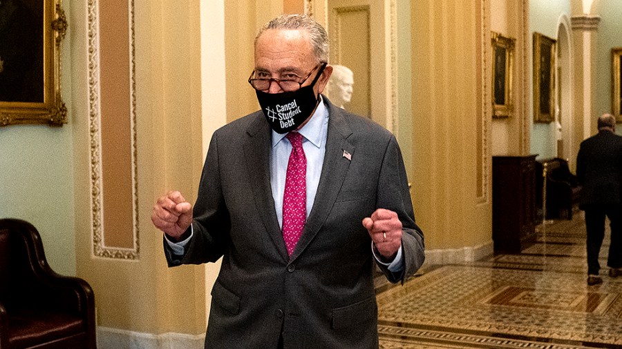 Majority Leader Charles Schumer (D-N.Y.) speaks to reporters outside the Senate Chamber following the passage of the bipartisan infrastructure bill on Tuesday, August 10, 2021.