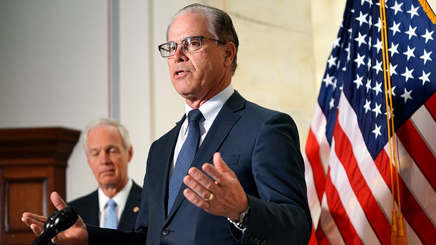 Sen. Mike Braun (R-Ind.) addresses reporters during a press conference on Thursday, June 10, 2021 to discuss finding out the origins of Covid-19.