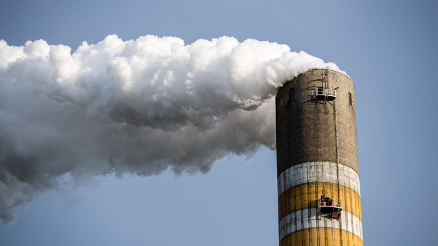 smoke billows from smokestack