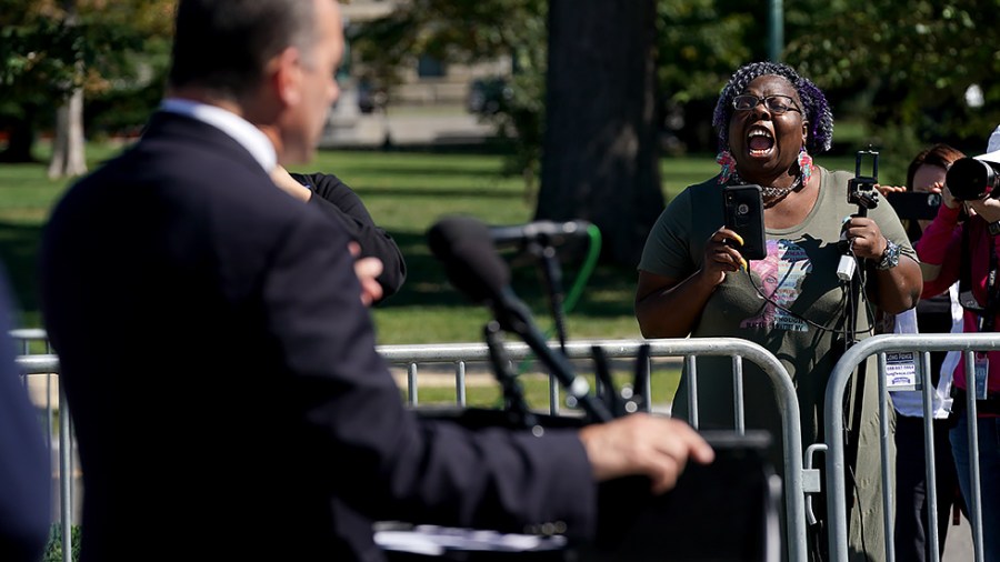 A protester attempts to interrupt Rep. Bob Good (R-Va.) during a press conference on Wednesday, September 29, 2021 where House Republicans are introducing the Defending Students' Civil Rights Act to stop Critical Race Theory teaching in schools.