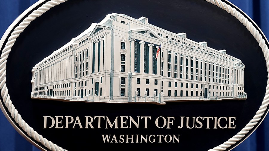 The Department of Justice logo is seen at their headquarters in Washington, D.C., on Thursday, August 5, 2021 prior to a press conference regarding a civil rights matter.