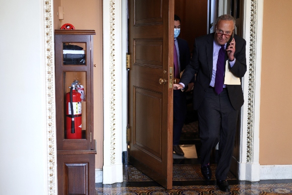 Senate Majority Leader Sen. Chuck Schumer (D-NY) leaves after a Senate Democratic Policy Luncheon