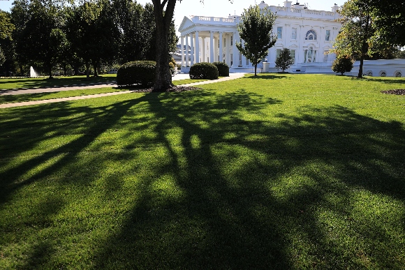 Shadows fall across the North Lawn of the White House