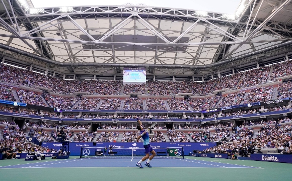 Serbia's Novak Djokovic serves to Russia's Daniil Medvedev during their 2021 US Open Tennis tournament men's final match