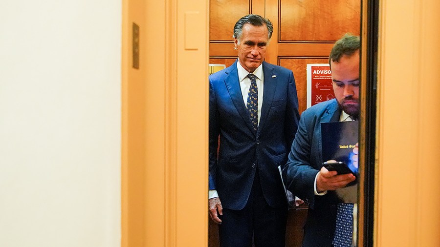 Sen. Mitt Romney (R-Utah) arrives to the Capitol for a vote on Wednesday, July 21, 2021.