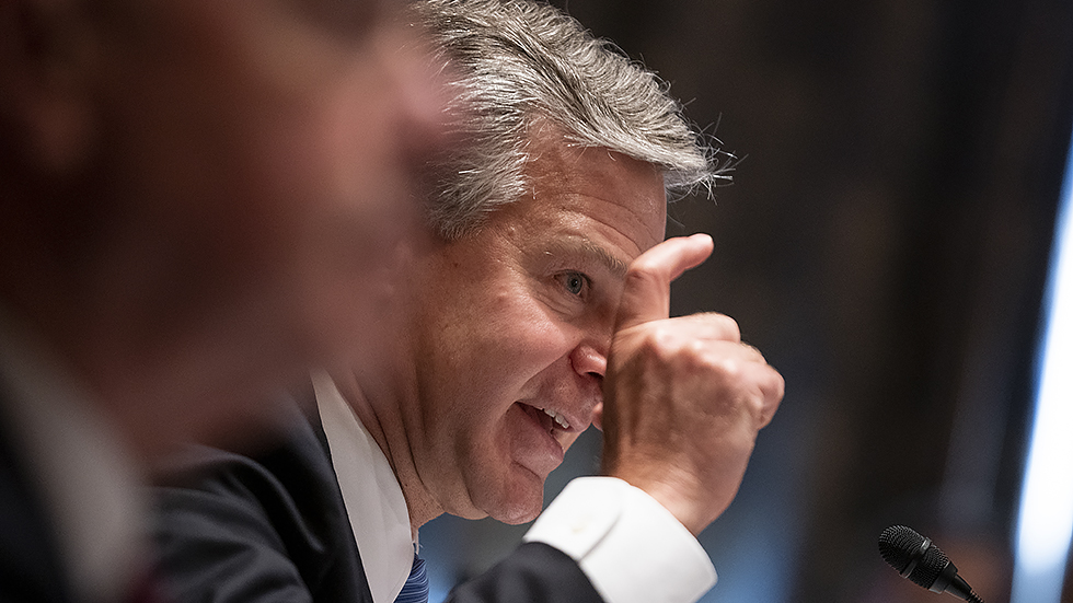 FBI Director Christopher Wray testifies during a Senate Homeland Security & Governmental Affairs Committee hearing to discuss security threats 20 years after the 9/11 terrorist attacks on Tuesday, September 21, 2021.