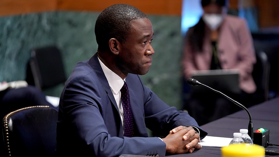 Deputy Treasury Secretary Wally Adeyemo listens to questions during a Senate Banking, Housing, and Urban Affairs Committee hearing on {iptcdow}, {monthname} {day}, {year4} to discuss international policy, sanctions and other issues.