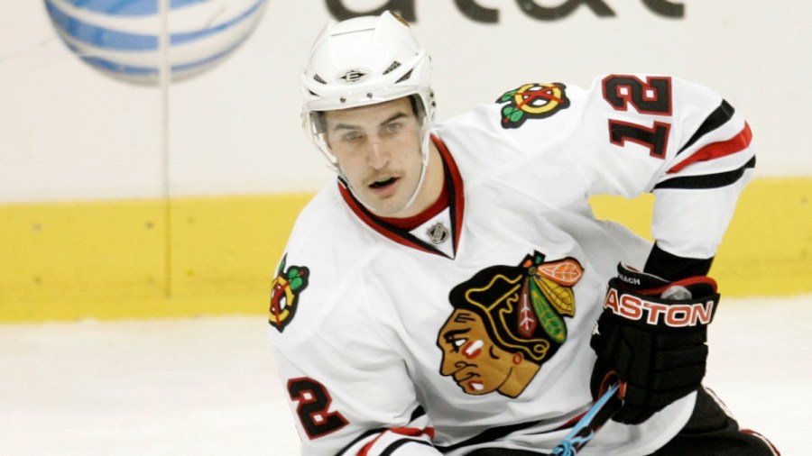 Chicago Blackhawks' Kyle Beach controls the puck in the first period of a preseason NHL hockey game against the Dallas Stars in 2008