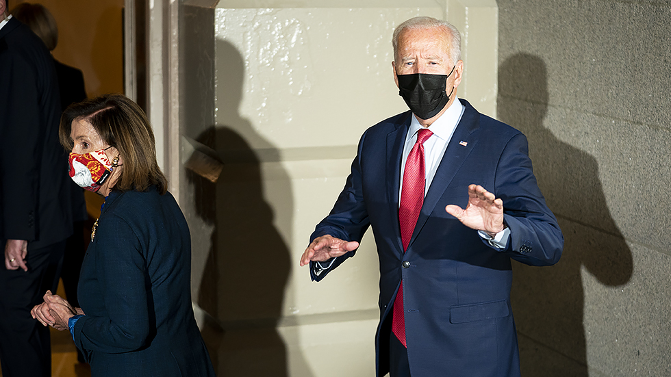 President Biden speaks to reporters after a Democratic Caucus meeting at the Capitol to discuss the bipartisan infrastructure plan on Friday, October 1, 2021.