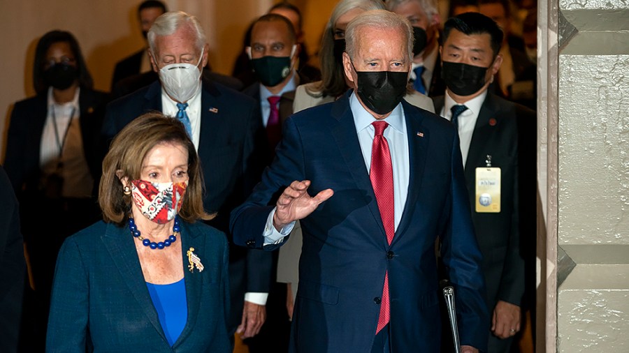 President Biden arrives for a Democratic Caucus meeting with Speaker Nancy Pelosi (D-Calif.) and Majority Leader Steny Hoyer (D-Md.) at the Capitol to discuss the bipartisan infrastructure plan on Friday, October 1, 2021.