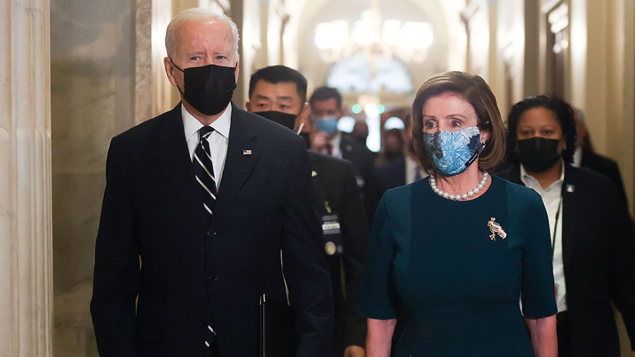 President Biden arrives with Speaker Nancy Pelosi (D-Calif.) for a House Democratic Caucus meeting to discuss the Build Back Better agenda and the bipartisan infrastructure deal on Thursday, October 28, 2021.