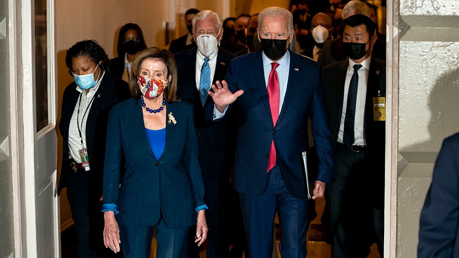 President Biden arrives for a Democratic Caucus meeting with Speaker Nancy Pelosi (D-Calif.) and Majority Leader Steny Hoyer (D-Md.) at the Capitol to discuss the bipartisan infrastructure plan on Friday, October 1, 2021.