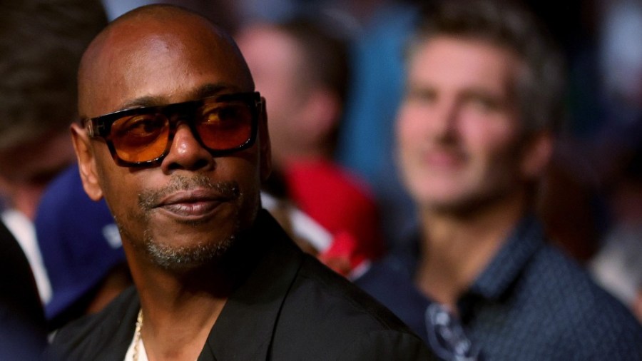 Dave Chappelle looks on during a UFC match in July