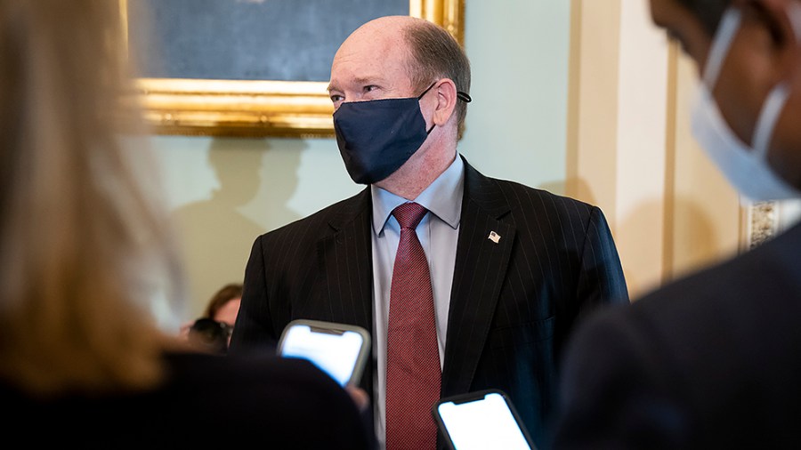 Sen. Chris Coons (D-Del.) addresses reporters before the weekly Senate Democratic policy luncheon on Tuesday, October 19, 2021.