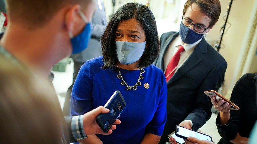 Rep. Pramila Jayapal (D-Wash.) speaks to reporters outside the House Chamber during a vote on the Further Surface Transportation Act on Thursday, October 28, 2021.