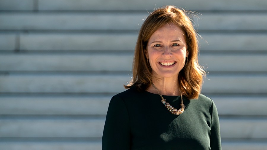 Supreme Court Justice Amy Coney Barrett participates in a photo op with Chief Justice John Roberts after Barrett’s investiture ceremony at the Supreme Court in Washington, D.C., on Friday, October 1, 2021.