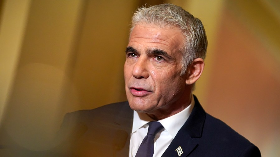 Israeli Foreign Minister Yair Lapid makes a statement during a photo op on Tuesday, October 12, 2021 prior to a meeting with Speaker Nancy Pelosi (D-Calif.) at the Capitol.