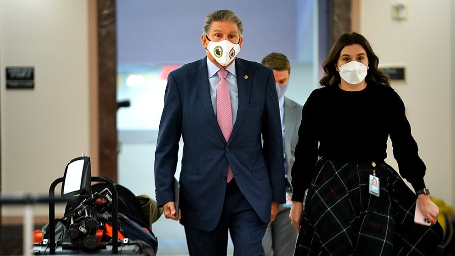 Sen. Joe Manchin (D-W.Va.) arrives for a Senate Energy and Natural Resources Committee hearing on Tuesday, October 5, 2021.