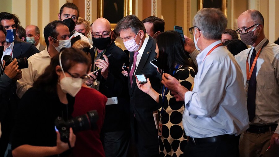 Sen. Joe Manchin (D-W.Va.) addresses reporters after the weekly Senate Democratic policy luncheon on Tuesday, October 19, 2021.