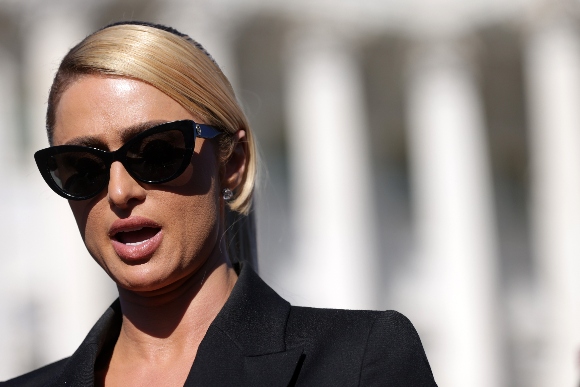 Actress and model Paris Hilton speaks during a news conference outside the U.S. Capitol