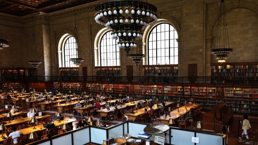 People study in the Rose Main Reading Room of the New York Public Library in Midtown Manhattan