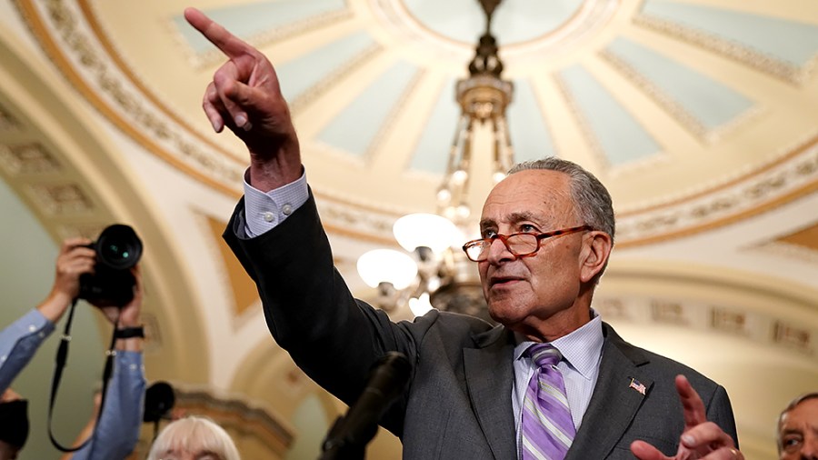 Majority Leader Charles Schumer (D-N.Y.) addresses reporters after the weekly policy luncheon on Tuesday, October 5, 2021.