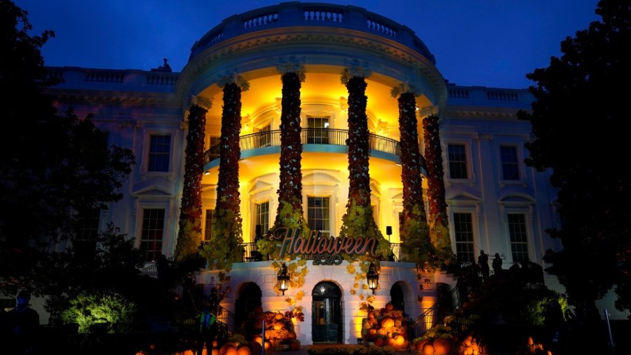 In this Oct. 25, 2021 file photo, the South Lawn of the White House is lit during a Halloween celebration at the White House in Washington