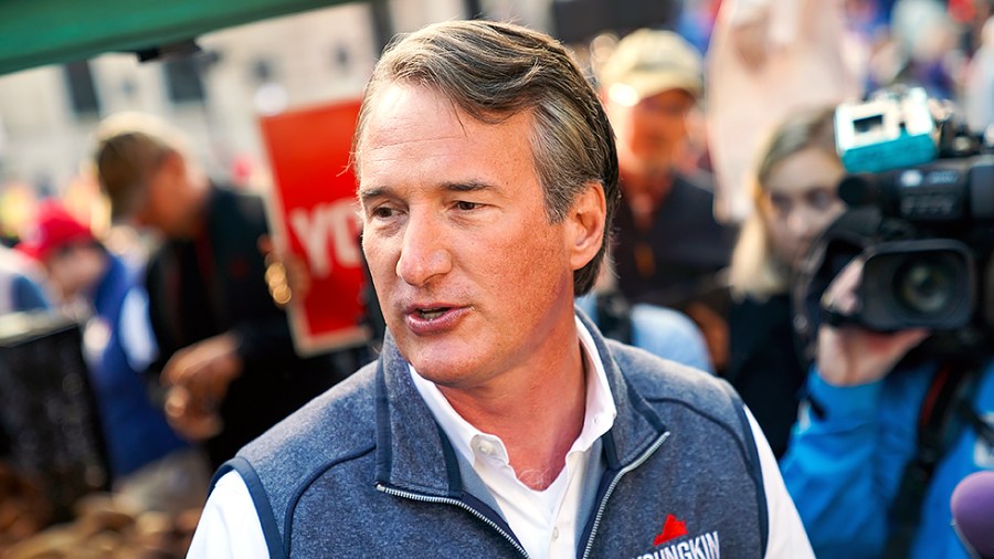 Virginia Republican gubernatorial candidate Glenn Youngkin addresses reporters after speaking to supporters and potential voters at the Alexandria Farmers Market in Alexandria, Va., on Saturday, October 30, 2021.