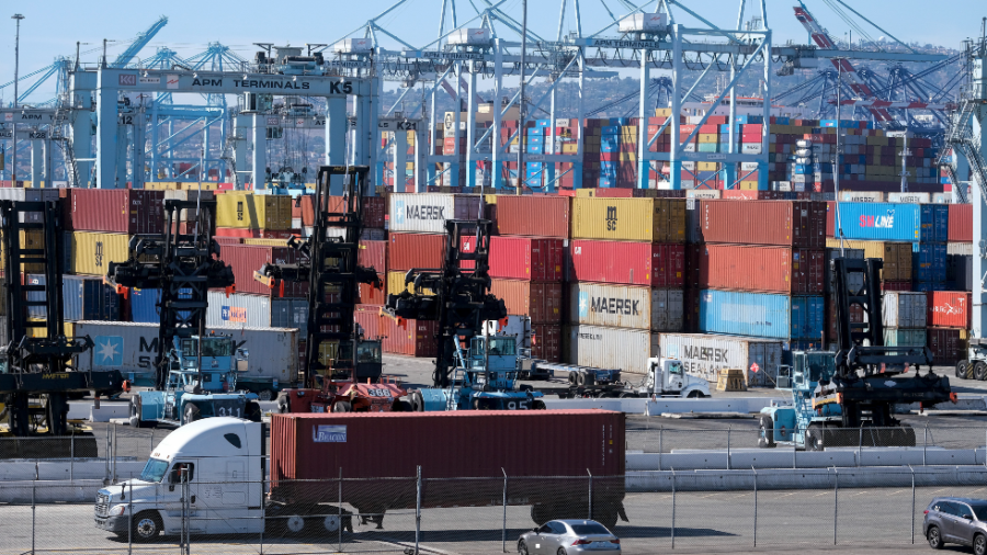 Cargo containers sit stacked at the Port of Los Angeles