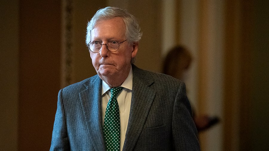 Minority Leader Mitch McConnell (R-Ky.) returns to his office from a Senate Republican luncheon on Thursday, November 18, 2021 as the Senate discuss moving forward with debating the National Defense Authorization Act.