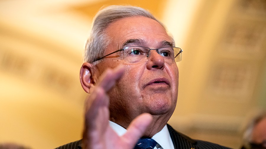 Sen. Robert Menendez (D-N.J.) addresses reporters after the weekly policy luncheon on Tuesday, November 16, 2021.