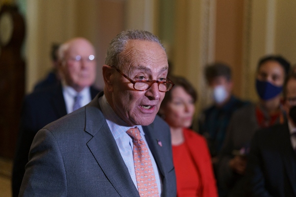 Senate Majority Leader Chuck Schumer, D-N.Y., talk about the need for the John Lewis Voting Rights Advancement Act