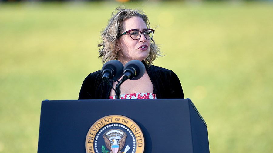 Sen. Kyrsten Sinema (D-Ariz.) speaks at a signing ceremony for the Infrastructure Investment and Jobs Act on the South Lawn of the White House on Monday, November 15, 2021.