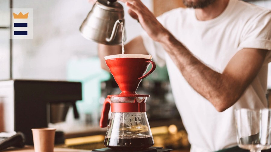 Man pouring water into a pour-over coffee maker