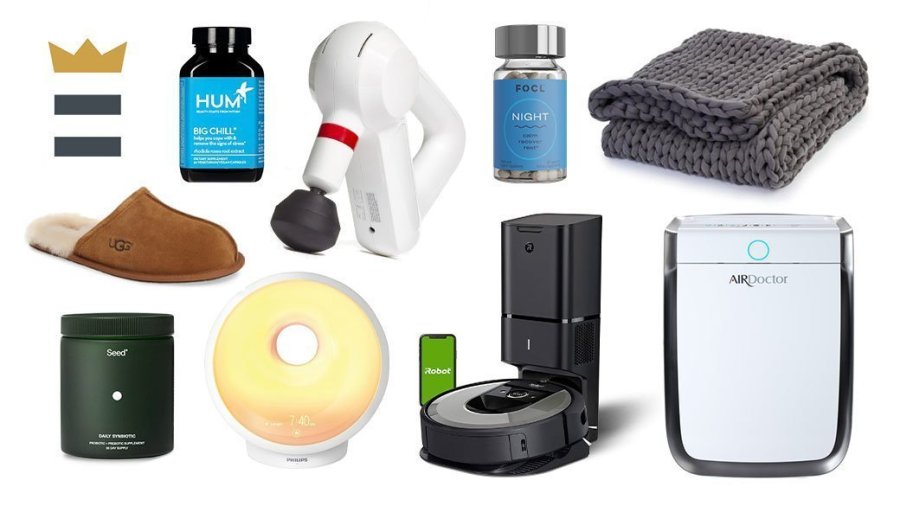 A slipper, candle, iRobot, Air Doctor, vitamins, blanket and lamp.