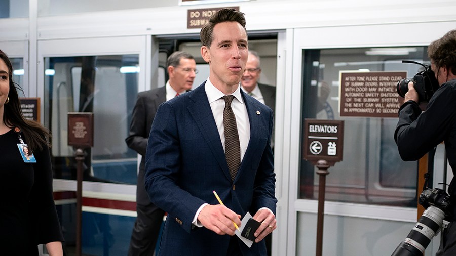 Sen. Josh Hawley (R-Mo.) arrives to the Capitol for a series of votes including the final passage of the National Defense Authorization Act and a judicial nomination on Wednesday, December 15, 2021.