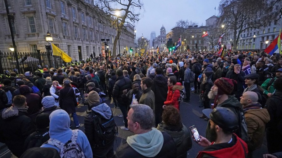 Anti -COVID-19 vaccination protesters demonstrate on Whitehall near Downing Street, in London