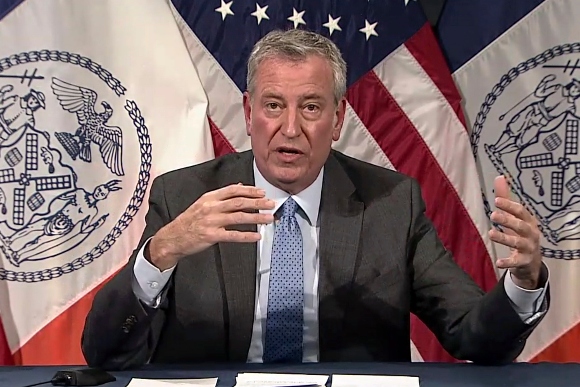 New York Mayor Bill de Blasio speaks during a virtual press conference