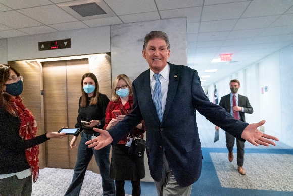 Sen. Joe Manchin, D-W.Va., leaves his office