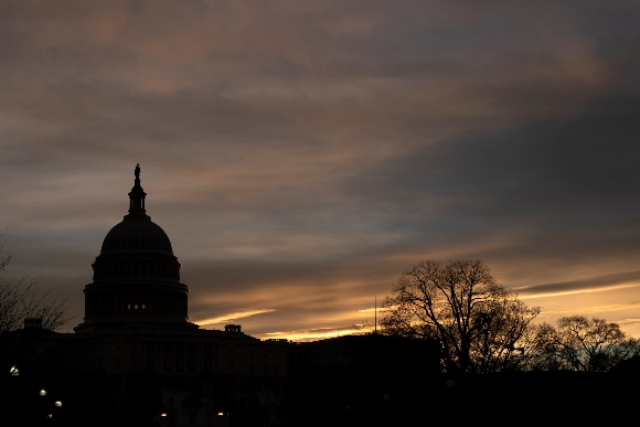 Morning sunrise illuminates the Capitol in Washington