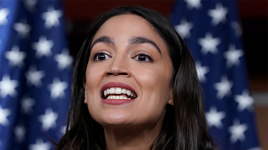 Rep. Alexandria Ocasio-Cortez (D-N.Y.) addresses reporters during a press conference on Wednesday, December 8, 2021 about a resolution condemning Rep. Lauren Boebert's (R-Colo.) use of Islamaphobic rhetoric and removing her from her current committees.