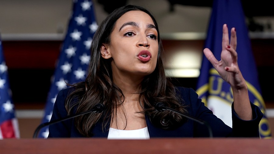 Rep. Alexandria Ocasio-Cortez (D-N.Y.) addresses reporters during a press conference on Wednesday, December 8, 2021 about a resolution condemning Rep. Lauren Boebert's (R-Colo.) use of Islamaphobic rhetoric and removing her from her committee assignments.