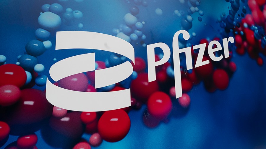 The Pfizer logo is displayed at the company's headquarters, Friday, Feb. 5, 2021, in New York City.