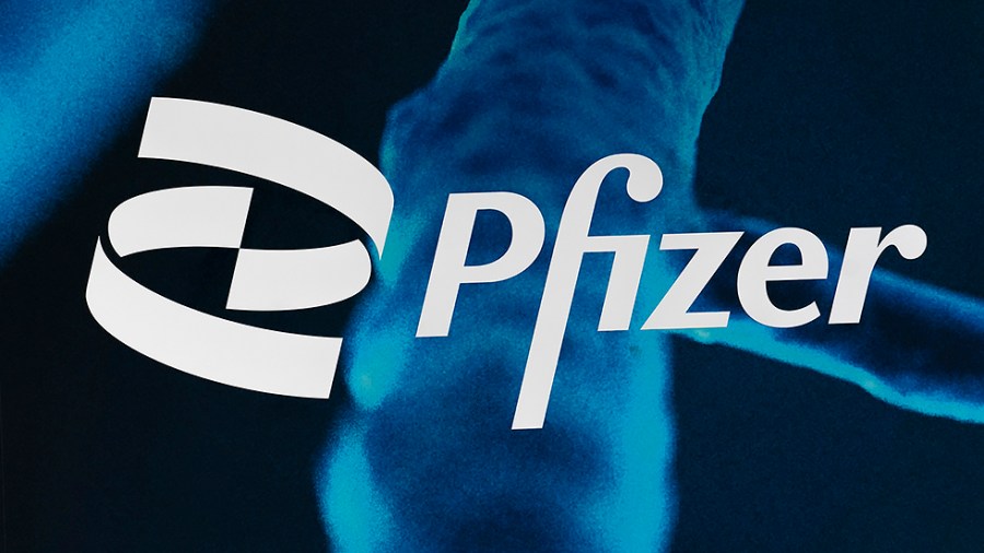 The Pfizer logo is displayed at the company's headquarters, Friday, Feb. 5, 2021, in New York City.