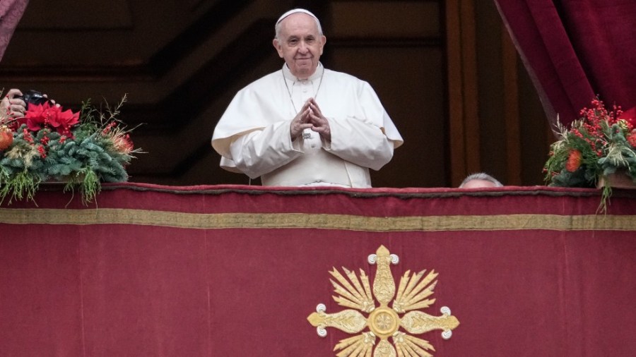 Pope Francis looks at the crowd before delivering the Urbi et Orbi Christmas day blessing